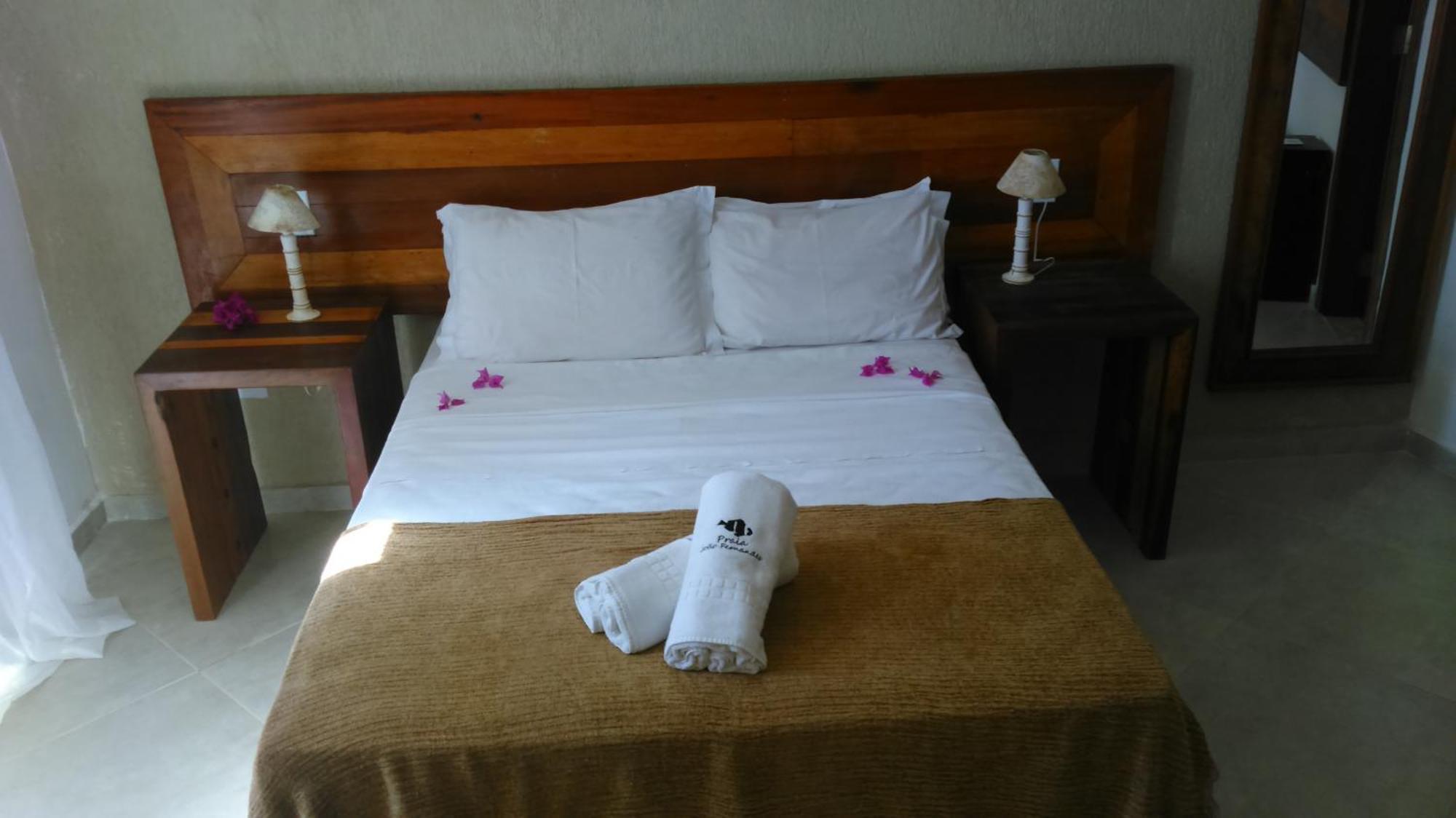 Pousada Praia Joao Fernandes Armacao dos Buzios Exterior photo A bed in a hotel room